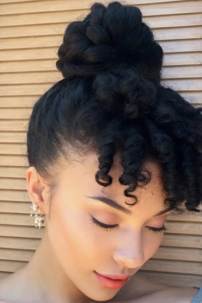 High Bun with Curly Bangs