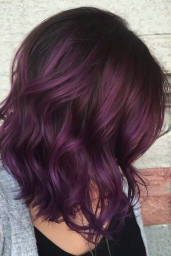 Wavy Hair with Midnight Violet Tones