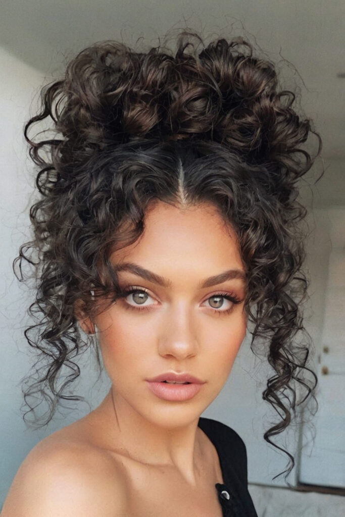 Messy Bun with Face Framing Curls