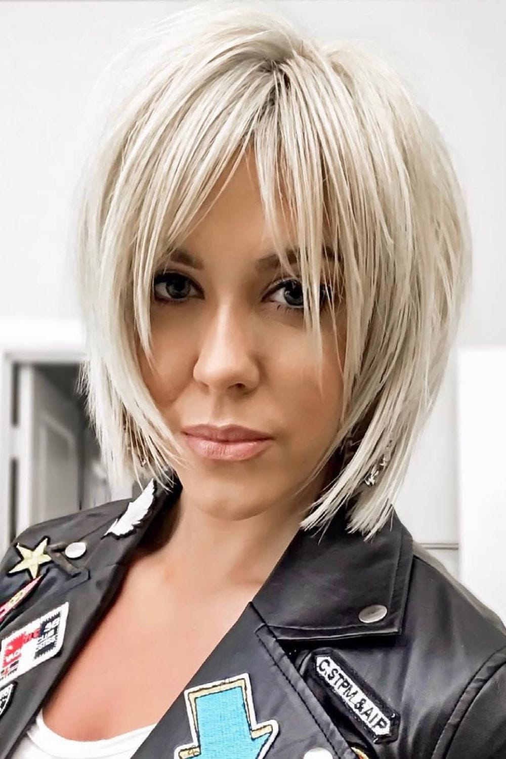 Rounded Bob with Straight Across Bangs