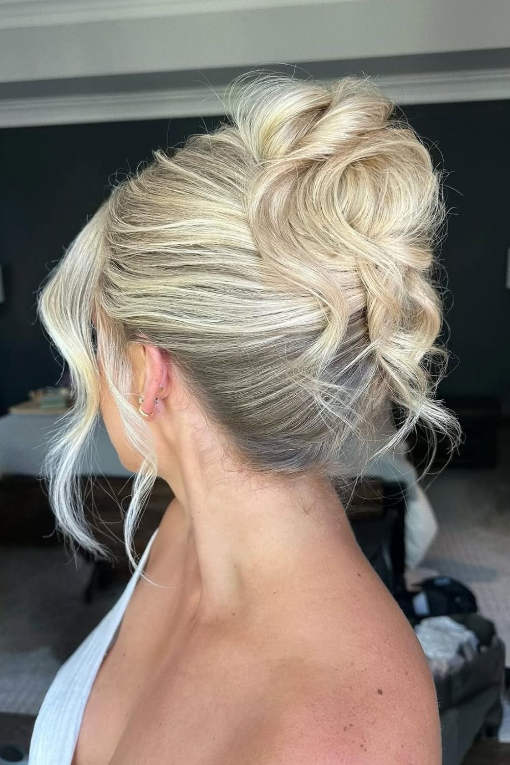 Classic High Bun with Curtain Bangs