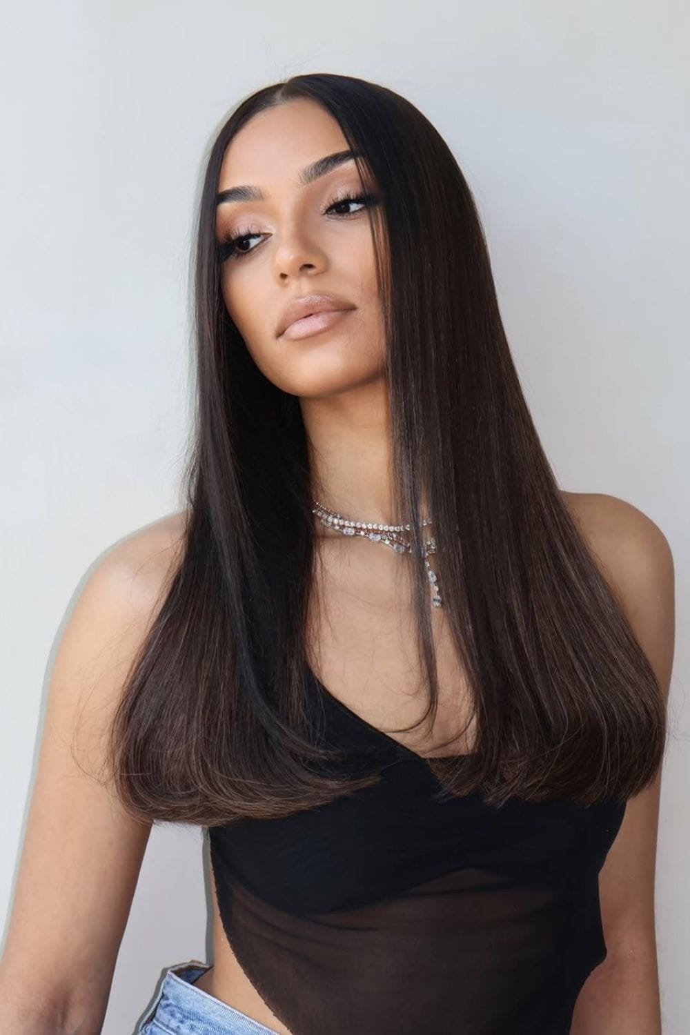 Sleek Straight Hair with Center Part